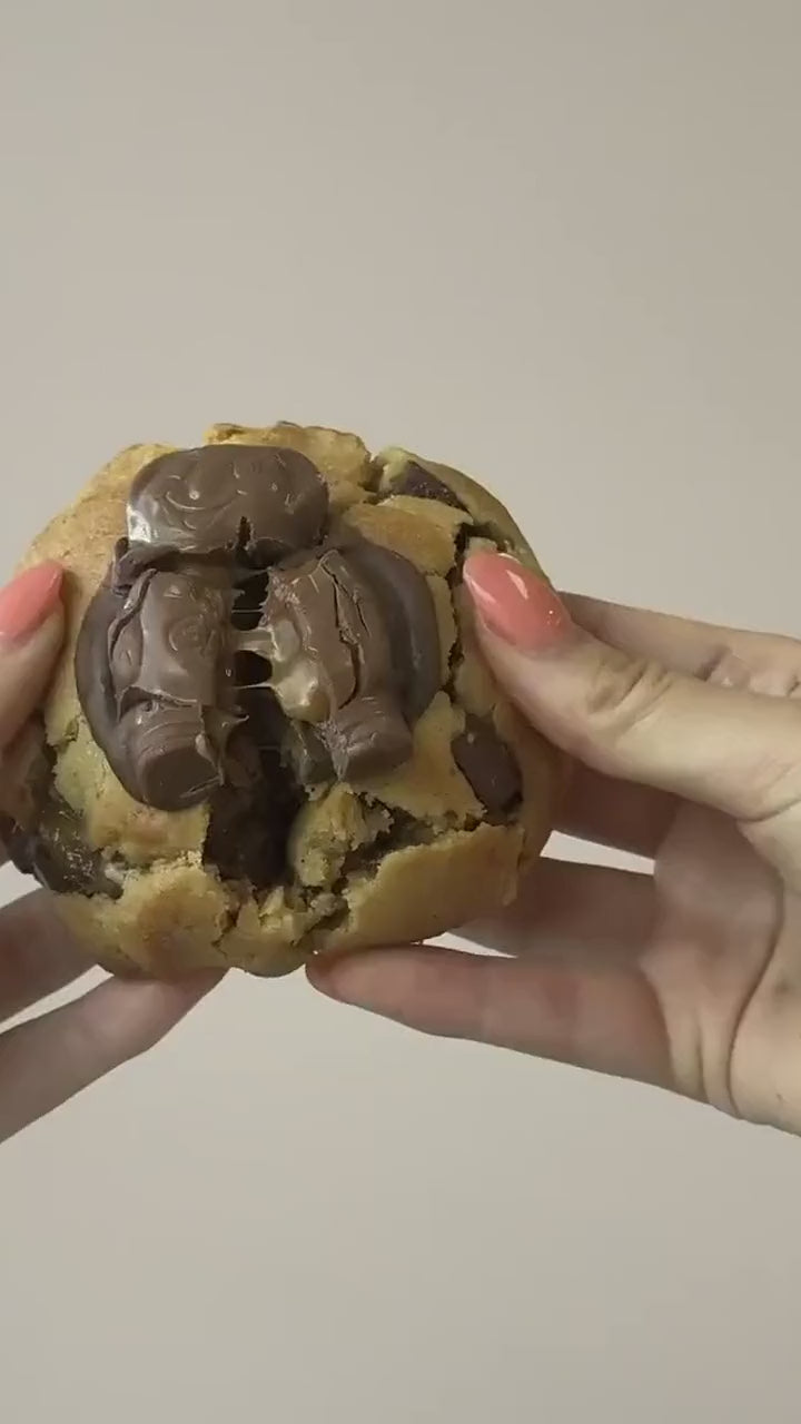 A warmed Big Boy Cookie being pulled apart